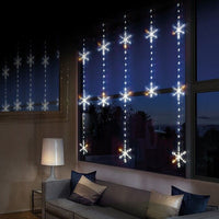 1.2m x 1.3m Curtain Snowflake Window Light with 390 White LEDs Premier Decorations Ltd